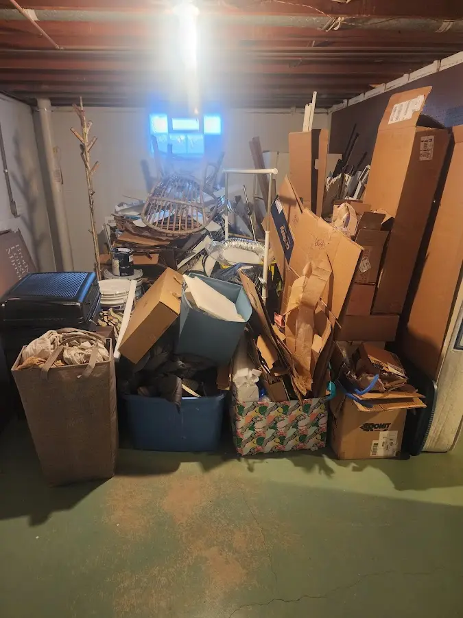 Roll-off dumpster container at job site for Construction Dumpster Rental in Englewood